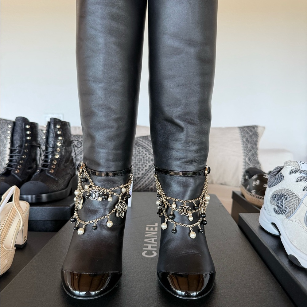 CHANEL Black Heeled Boots with Gold Chains